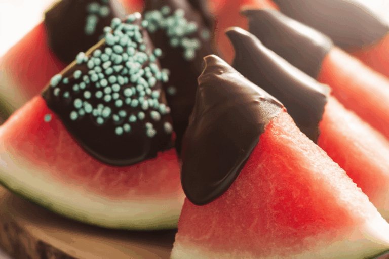 Chocolate watermelon dipped wedges on summer board