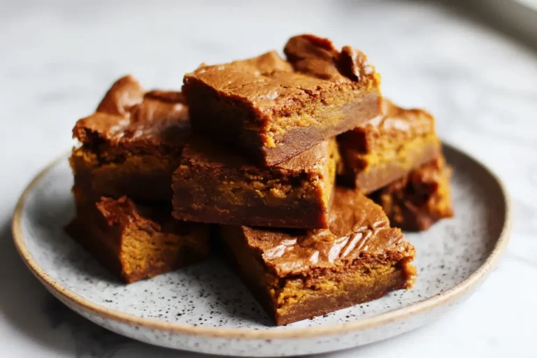 chewy brown butter pumpkin blondies on ceramic plate