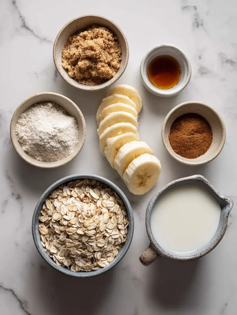 Ingredients for caramelised banana oatmeal laid out on marble counter